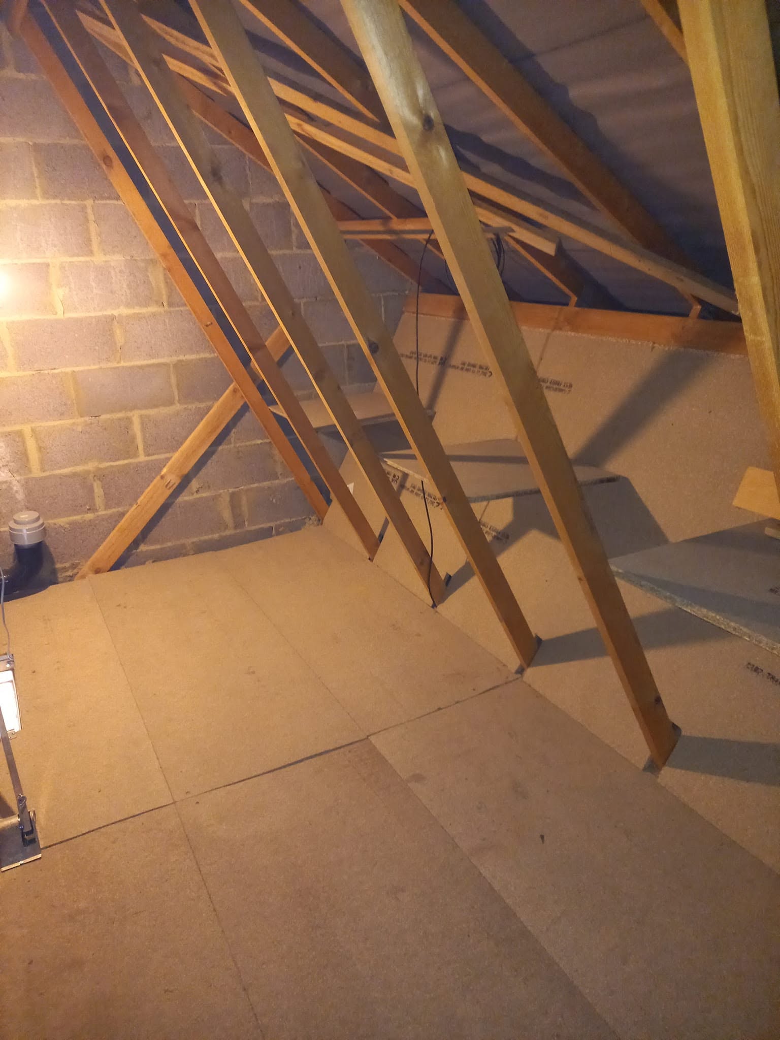 Loft boarding and construction work within a roof space
