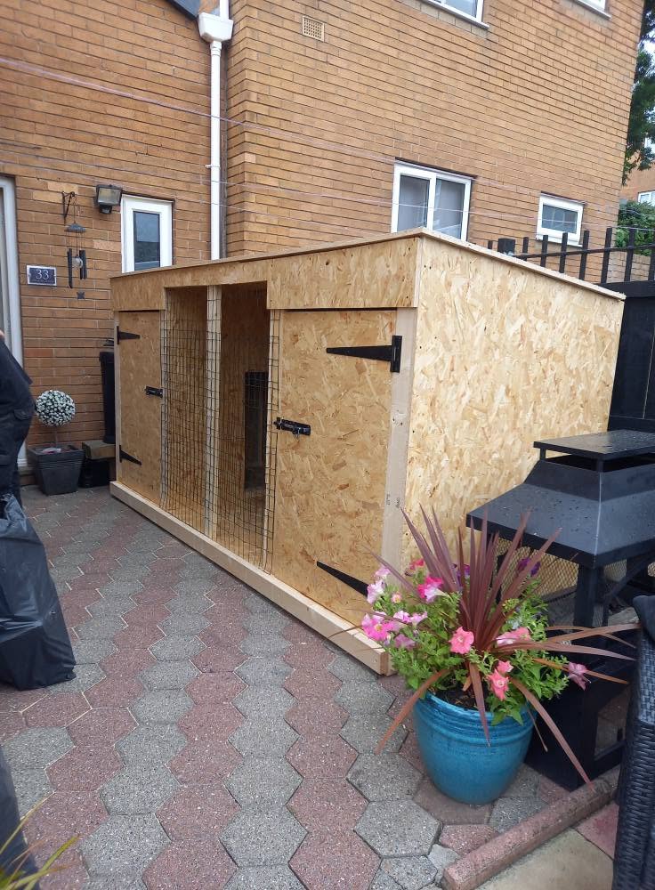 Custom outdoor timber structure built in a residential garden